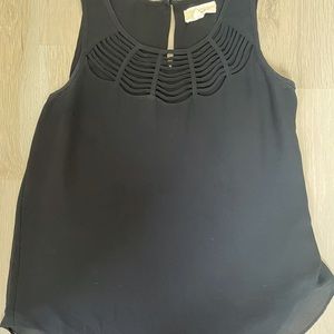 Women’s shirt, size small.